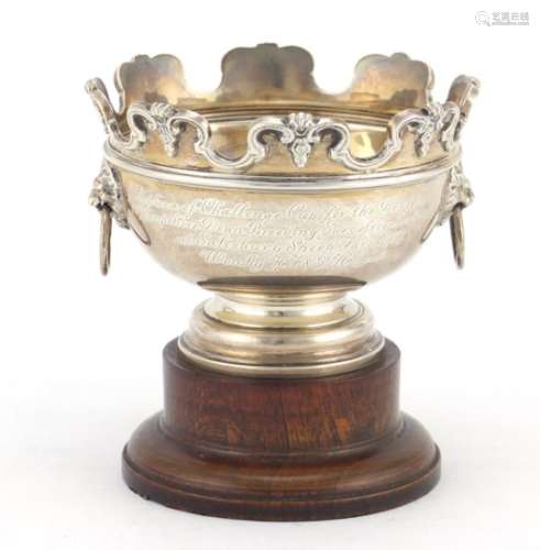 Circular silver trophy with lion mask handles by Adie Brothers Ltd, Birmingham 1937, 7cm high