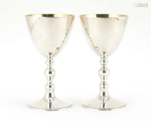 Pair of silver chalices with gilt interiors, by Marlow Brothers, London 1977, 14cm high, 486.6g :