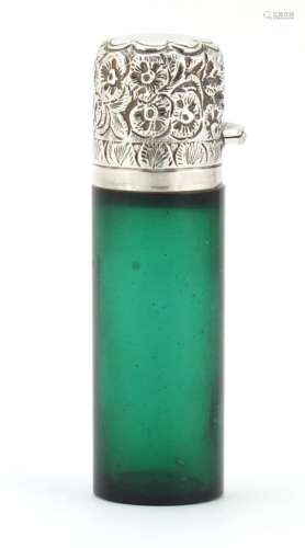 Victorian green glass scent bottle with silver hinged lid and stopper by Hilliard and Thomason,