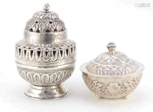 Two Indian silver coloured metal pots and covers, the largest 13cm high, 397.5g : For Further