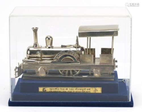 Indian silver coloured metal locomotive - Fairy Queen, celebrating 150th Year of Indian Railways,