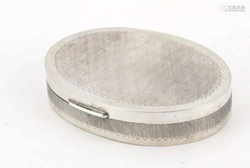 Oval silver box and cover with hinged lid, impressed SILVER to the base, 10cm in length, 95.8g : For