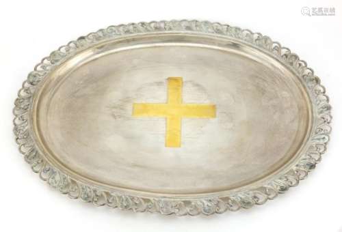 Large oval silver tray with pierced border, presented to Sir J K Chande, 46.5cm in length : For