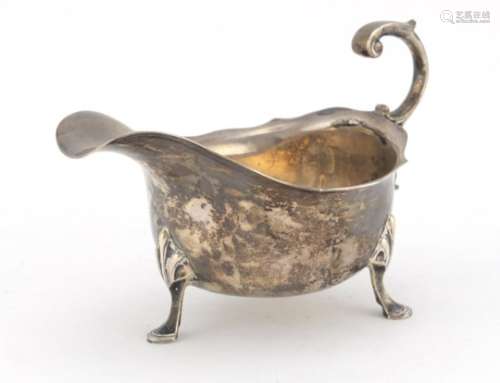 Silver sauce boat by James Dixon & Sons Ltd, raised on with three hoof feet, Sheffield 1937, 15.