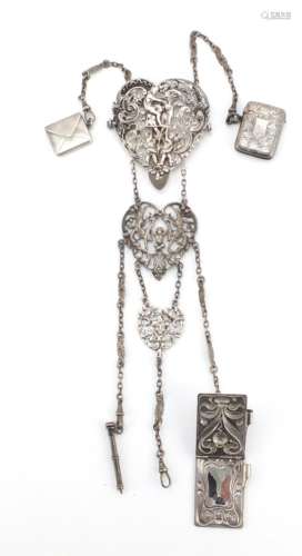 Victorian silver chatelaine with vesta, stamp case, propelling pencil and aide-mémoire, the