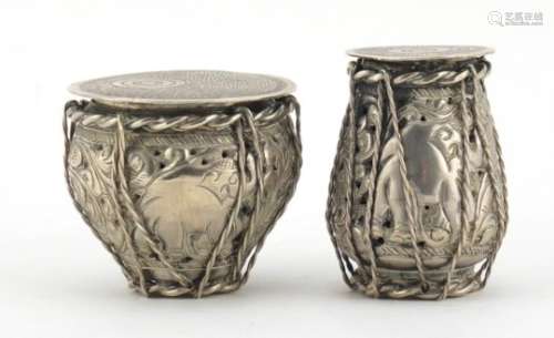 Two Indian unmarked silver boxes with detachable lids, pierced and embossed with elephants (tests as