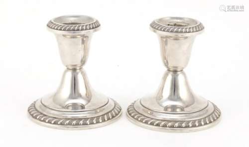 Pair of American Gorham sterling silver candlesticks, 8.5cm high, 473.6g : For Further Condition