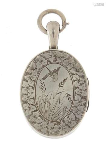 Victorian Aesthetic unmarked silver locket engraved with a bird amongst reeds, 6cm in length, 23.