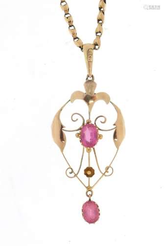 Art Nouveau unmarked gold pendant, set with pink stones on a 9ct gold necklace, the pendant 5.5cm in