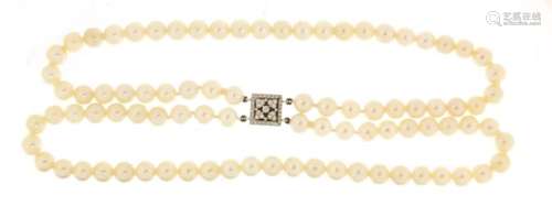 Two string pearl necklace with 18ct white gold diamond clasp, 32cm in length, 62.0g : For Further