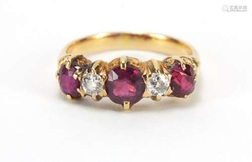 Unmarked gold, ruby and diamond five stone ring with scroll settings, size L, 3.1g : For Further