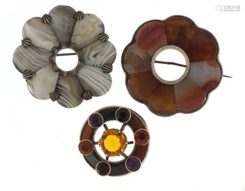 Two Scottish unmarked silver agate brooches and one other, one set with semi precious stones, the