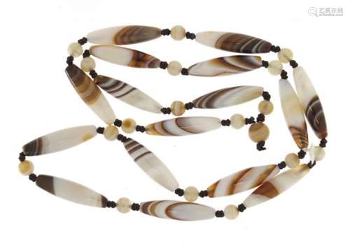 Islamic agate elongated bead necklace, 60cm in length, 44.2g : For Further Condition Reports