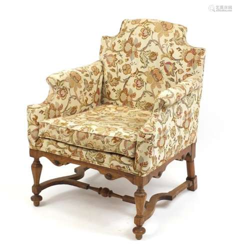 Arts and Crafts design carved oak chair arm chair with cream floral upholstery, 87cm high : For