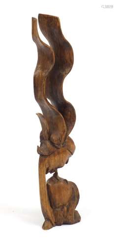 Floor standing carved wood sculpture of embracing figures, 83cm high : For Further Condition Reports