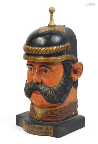 Large hand painted carved wood bust of Sir Percy Flanagan founder off Flanagan's during the Indian