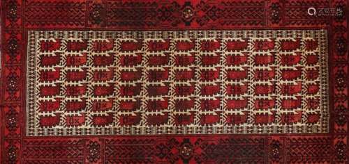 Persian red ground rug, 182cm x 90cm : For Further Condition Reports Please Visit Our Website,