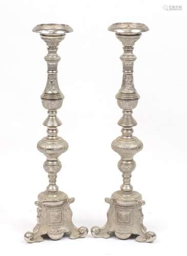 Pair of silvered metal floorstanding candlesticks, 79cm high : For Further Condition Reports