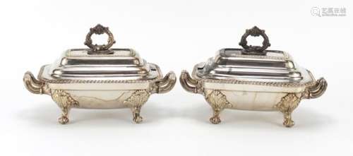 Pair of silver plated sauce tureens with covers and twin handles, each engraved with crests, 20.