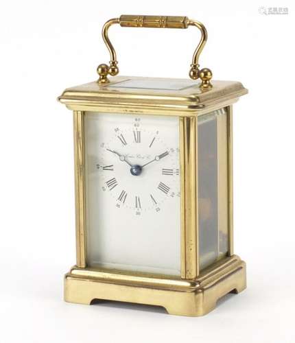 Brass cased carriage clock by The London Clock Co, 11.5cm high : For Further Condition Reports