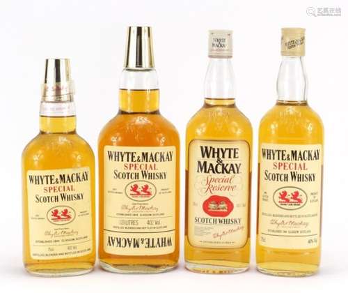 Four vintage bottles of Whyte and Mackay Scotch Special Whisky comprising sizes 1.13l, 75cl and 70cl