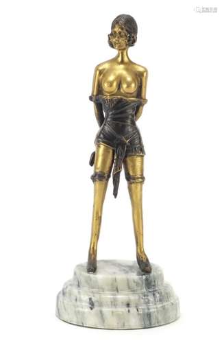 Erotic bronze figure of a dominatrix raised on a step marble base, 32cm high : For Further Condition