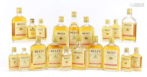 Nineteen vintage bottles of Bells Extra Special Whisky comprising 37.5cl, 9.4cl and 10cl bottles :