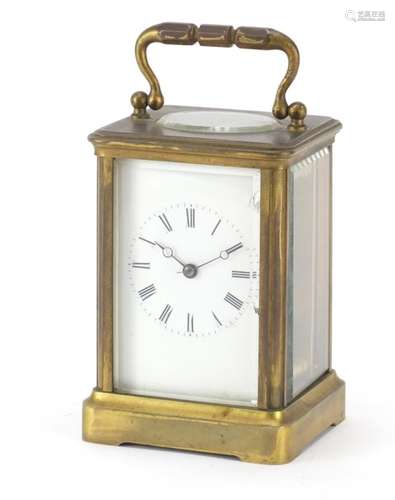 Large brass cased carriage clock with enamelled dial and Roman numerals, the back plate numbered