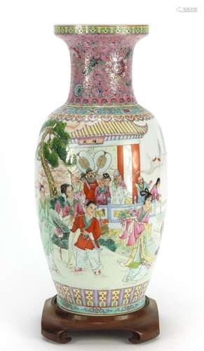 Large Chinese porcelain vase, hand painted with figures, flowers and script, raised on a hardwood