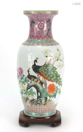 Large Chinese porcelain vase, hand painted with birds of paradise, raised on a hardwood stand,