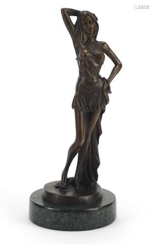 Patinated bronze study of a scantily dressed female raised on a circular marble base, 32cm high :