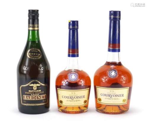 Two bottles of Courvoisier cognac and a bottle of Bardinet Napoleon brandy : For Further Condition