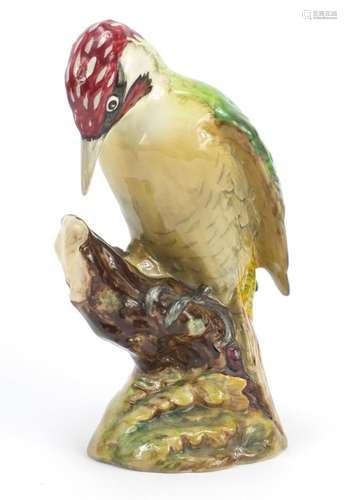 Beswick woodpecker perched on a branch, numbered 1218, 22cm high : For Further Condition Reports