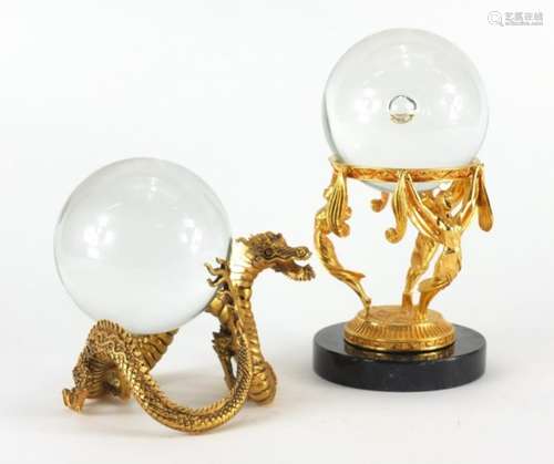 Two Franklin Mint crystal balls on stands including Merlin's crystal ball, the largest 20.5cm high :