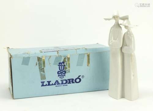 Lladro figure group of two nuns with box, 33cm high : For Further Condition Reports Please Visit Our