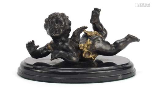 Patinated bronze model of a cherub raised on an oval marble base, 18.5cm wide : For Further