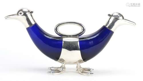 Large silver plated double duck decanter with blue glass bodies, 37.5cm wide : For Further Condition