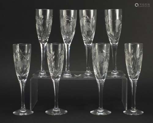 Set of eight Stuart crystal champagne flutes etched with flowers, each 21.5cm high : For Further