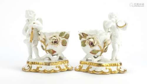 Pair of classical putti design salts, each 18cm high : For Further Condition Reports Please Visit