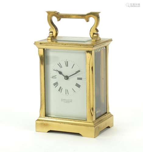 Brass cased carriage clock, retailed by Seale & Co of The Royal Exchange London, with Roman