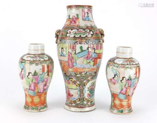 Three Chinese Canton porcelain vases comprising a pair and a larger example with elephant head