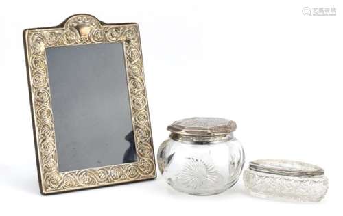 Rectangular silver easel photo frame and two cut glass jars with silver lids, the photo frame 19cm