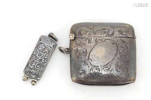 Rectangular silver vesta and a silver cigar cutter, Birmingham hallmarks, the vesta 4.5cm in length,