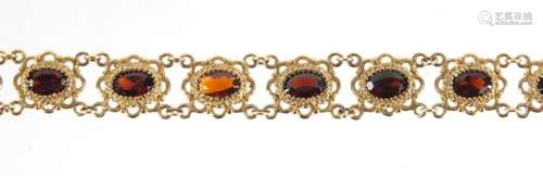 9ct gold garnet bracelet, 19cm in length, 12.0g : For Further Condition Reports Please Visit Our