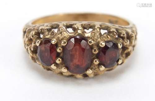 9ct gold garnet three stone ring, size P, 4.6g : For Further Condition Reports Please Visit Our