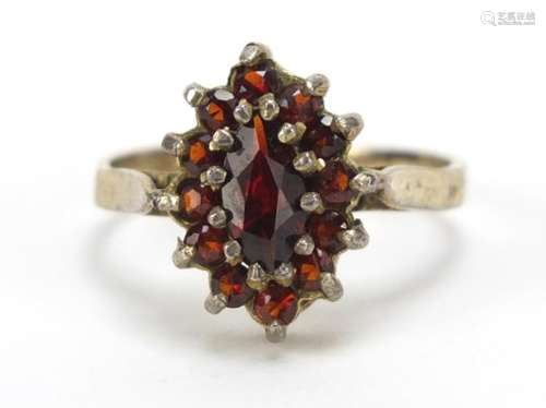 Unmarked gilt metal garnet cluster ring, size N, 2.8g : For Further Condition Reports Please Visit