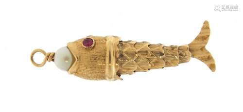 9ct gold articulated fish charm with pink eyes, 3.5cm in length, 1.3g : For Further Condition