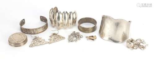 Mostly silver jewellery including bracelets, fish earrings, apple pendant and napkin ring, 163.