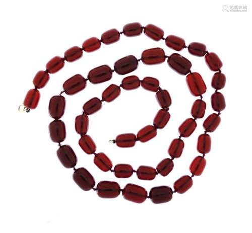 Cherry amber coloured bead necklace, 80cm in length, 77.6g : For Further Condition Reports Please