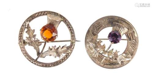 Two Scottish silver thistle brooches set with amethyst and citrine, the largest 3.5cm in diameter,